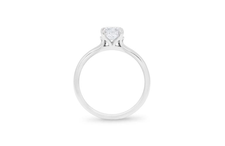 Cushion cut diamond solitaire ring design with decorative basket engagement