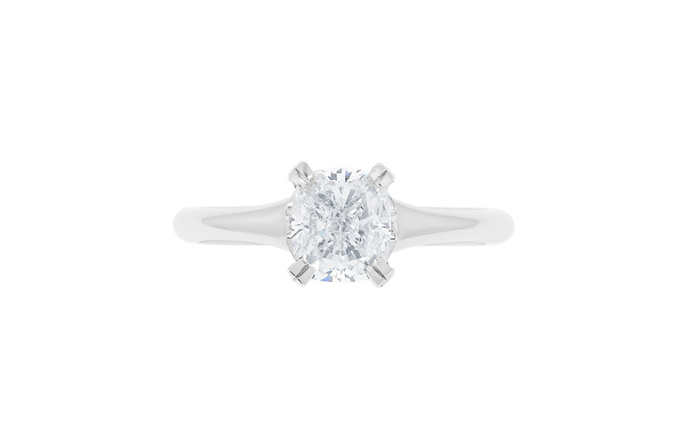 Cushion cut diamond solitaire ring design with decorative basket engagement