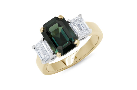 Dark green sapphire and diamond three stone dress engagement ring yellow gold