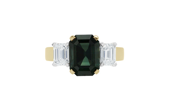 Dark green sapphire and diamond three stone dress engagement ring yellow gold