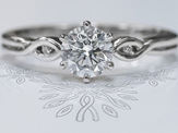 Diamond solitaire engagement ring crossover diamond accent band in platinum