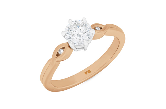 Diamond solitaire engagement ring in 18ct rose gold and platinum