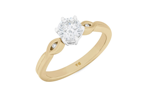 Diamond solitaire engagement ring in 18ct yellow gold and platinum