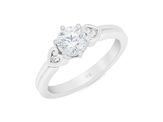 Diamond solitaire engagement ring with koru heart band details platinum gold