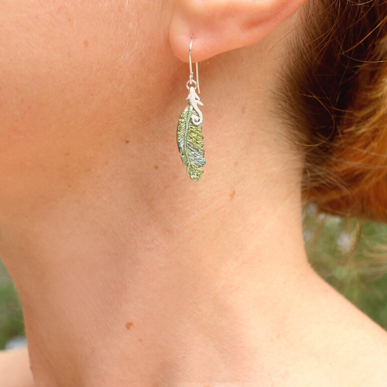 feathers kereru bird green blue white koru  earring worn nz jewellery handmade
