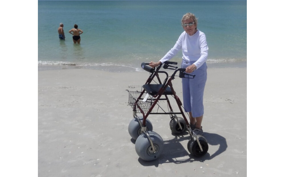 First Lady, Barbara Bush enjoying her walk along the beach with the Debug Walker