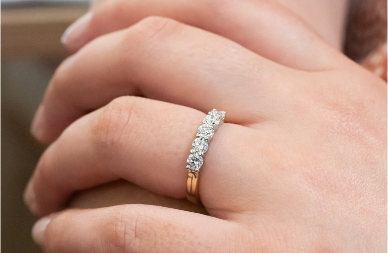 Five stone diamond eternity wedding ring band koru detail maori inspired furl