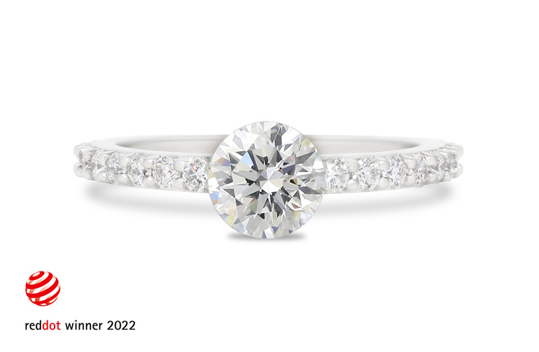 Floating diamond solitaire engagement ring diamond set band platinum titanium
