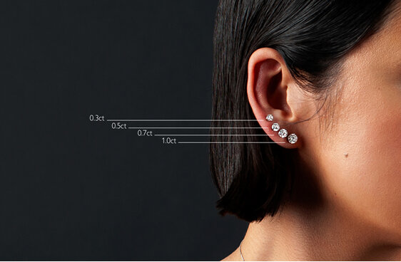 Floeting Diamond earring studs size comparison chart on model