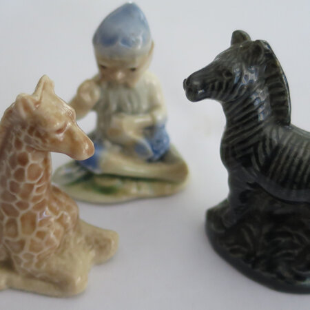 Giraffe, horse and leprechaun