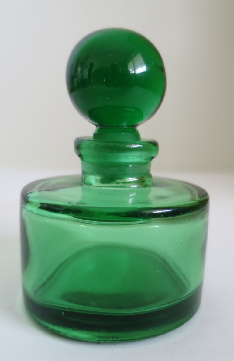 Green bottle with stopper