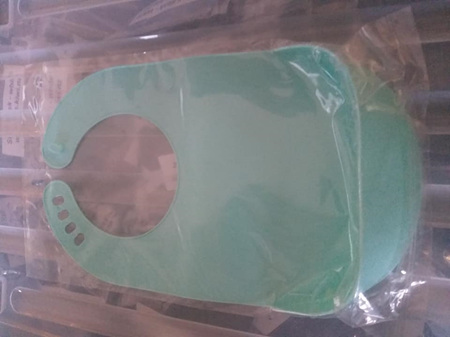 Green plastic adjustable easy wipe bib