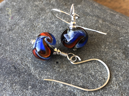 Handmade glass earrings - cosmic swirl - Blue/orange