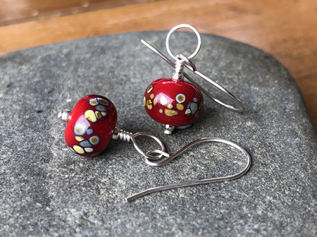 Handmade glass earrings - frit - jitterbug on red