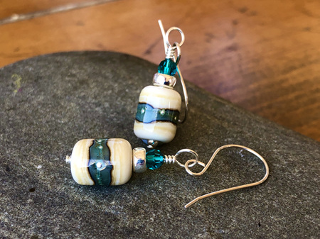 Handmade glass earrings - organic barrels - copper green on ivory