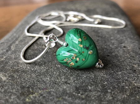 Handmade glass heart pendant - jitterbug on grass green
