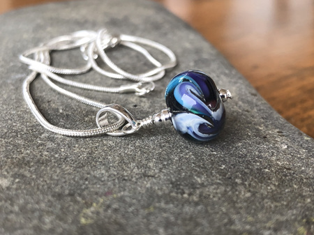 Handmade glass pendant - cosmic swirl - Pale blue/purple