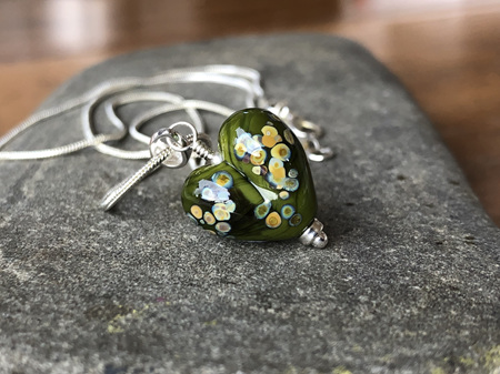 Handmade glass pendant - heart - jitterbug on cave green