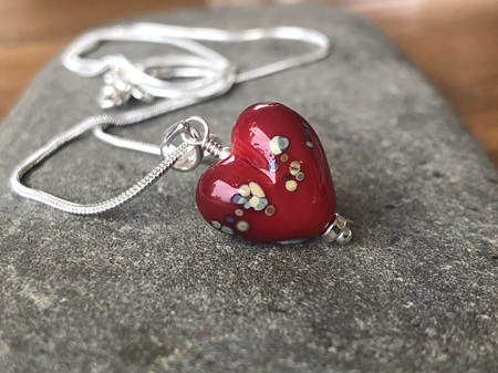 Handmade glass pendant - heart - jitterbug on red