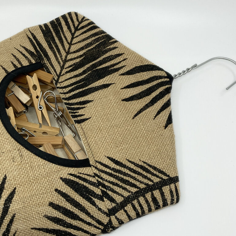 hanging peg bag hessian palm print shown with pegs