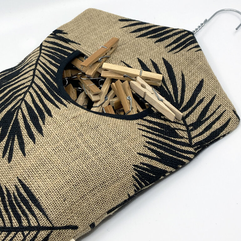 hanging peg pouch hessian palm leaf print shown with pegs
