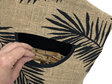 hanging peg pouch hessian palm leaf print with hand in pocket