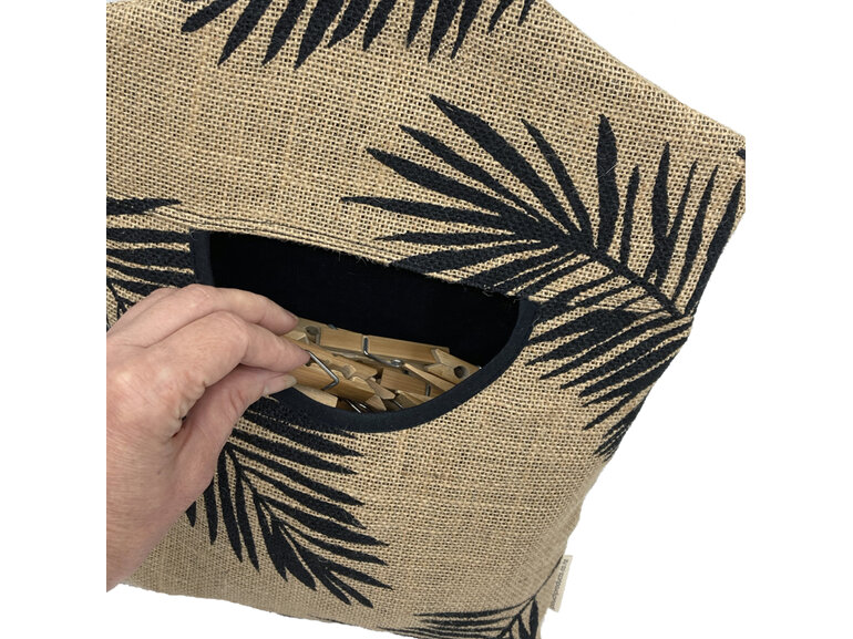 hanging peg pouch hessian palm leaf print with hand in pocket