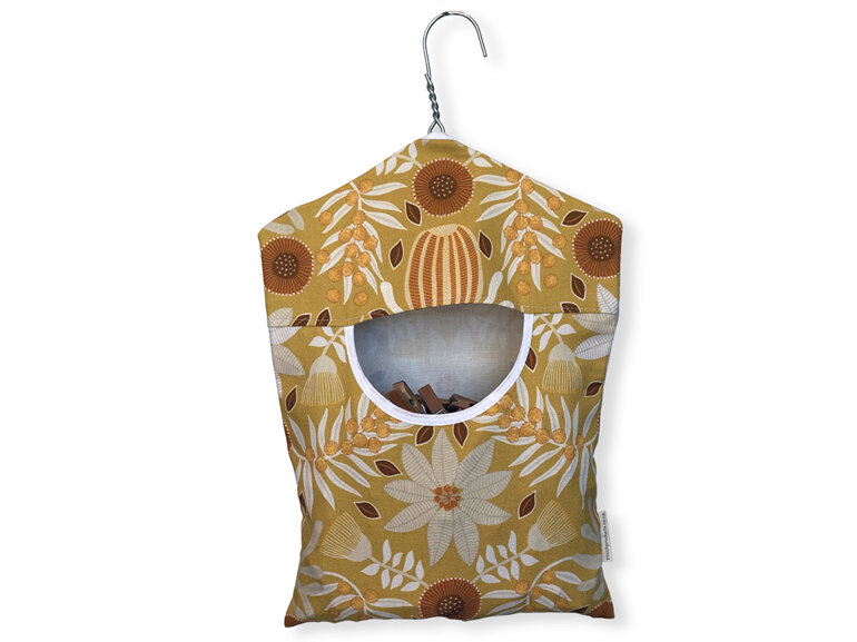 hanging peg pouch mustard flora design front view