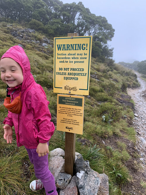 happy in the rain kids hiking