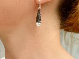 huia feather black white sterling silver native  earrings worn koru lily griffin