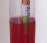 Hydrometer reading approximately 1.074 closeup