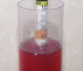 Hydrometer reading at approximately 1.046 closeup