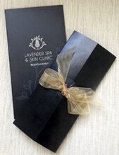 image of lavender spa voucher wrapped with a bow