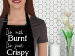 It's not burnt it's crispy funny apron