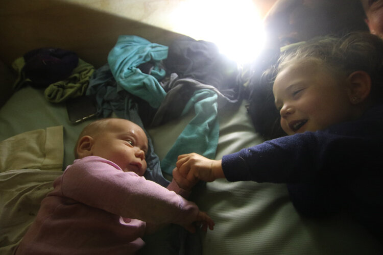 kids sleeping in a hut nz backcountry