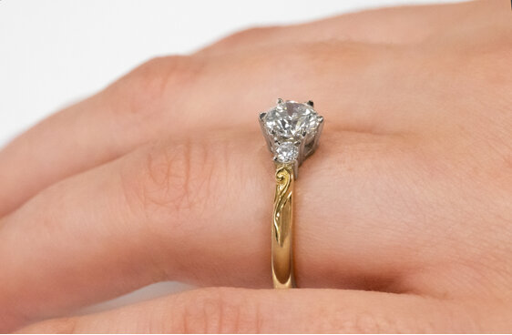 Koru motif band diamond three stone engagement ring yellow gold platinum