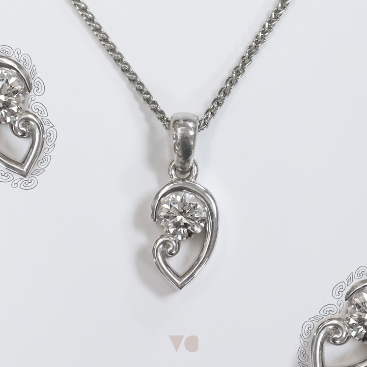 koru motif detail diamond solitaire pendant unique necklace nz maori culture