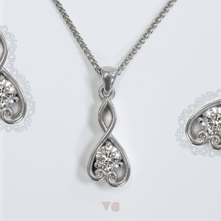 Koru motif diamond solitaire pendant platinum 18ct white gold nz maori jewellery