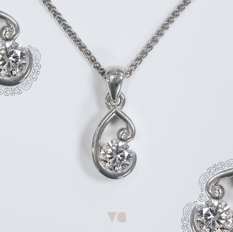 Koru motif platinum diamond pendant design maori nz aotearoa jewellery