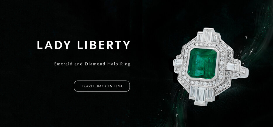 Lady Liberty- Emerald and Diamond Art Deco Halo Ring in lustrous platinum
