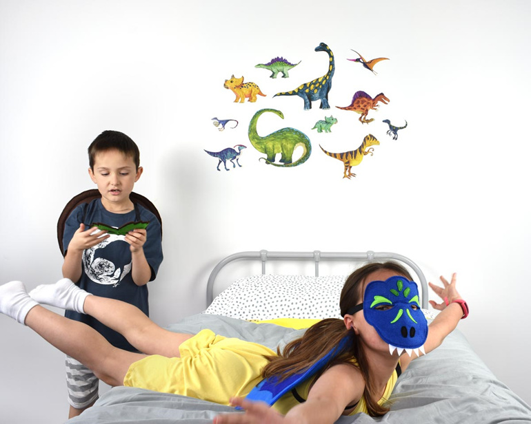 Large dinosaur wall decal with children playing