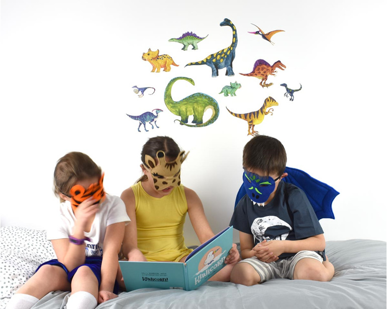 Large dinosaur wall decal with children reading a book