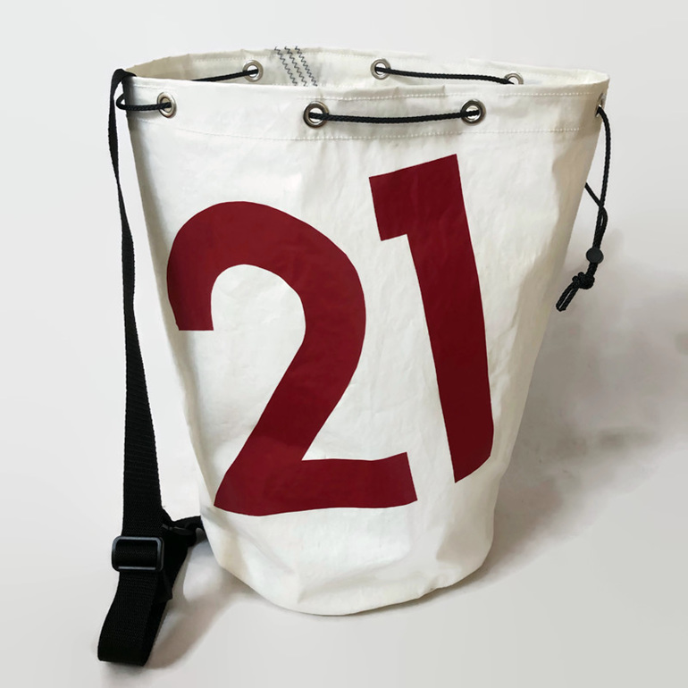 Large duffle bag made from upcycled sailcloth with the numbers 21 on front.