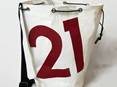 Large duffle bag made from upcycled sailcloth with the numbers 21 on front.