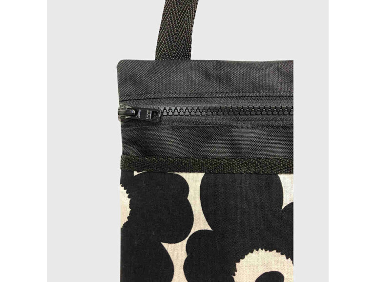 Marimekko fabric bag with zip and pocket on the front.  NZ made