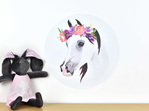 Medium horse wall decal with flower crown on white background with bunny toy