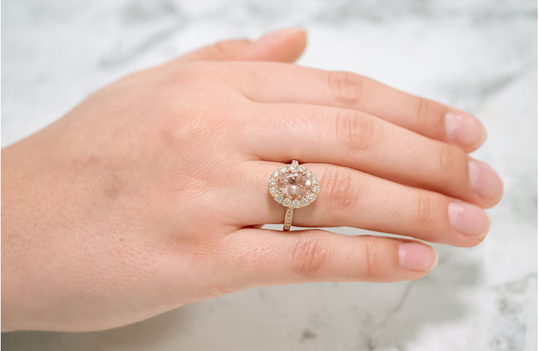 Morganite and Diamond Halo Ring in 18ct Rose Gold showcased on hand