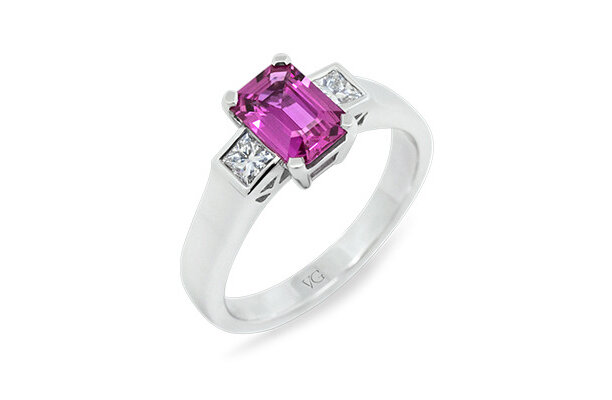 Natural pink sapphire and diamond ring crafted in platinum