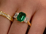 Octagonal Emerald and Diamond Three Stone Ring Yellow Gold