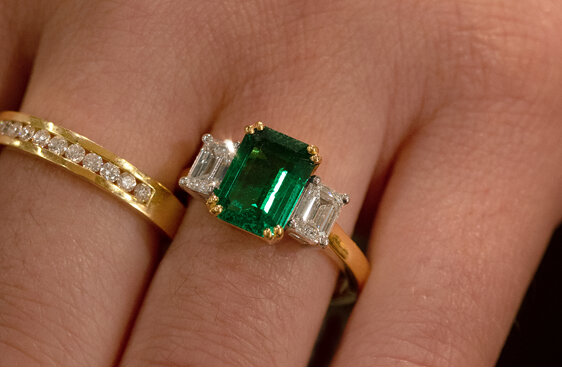 Octagonal Emerald and Diamond Three Stone Ring Yellow Gold